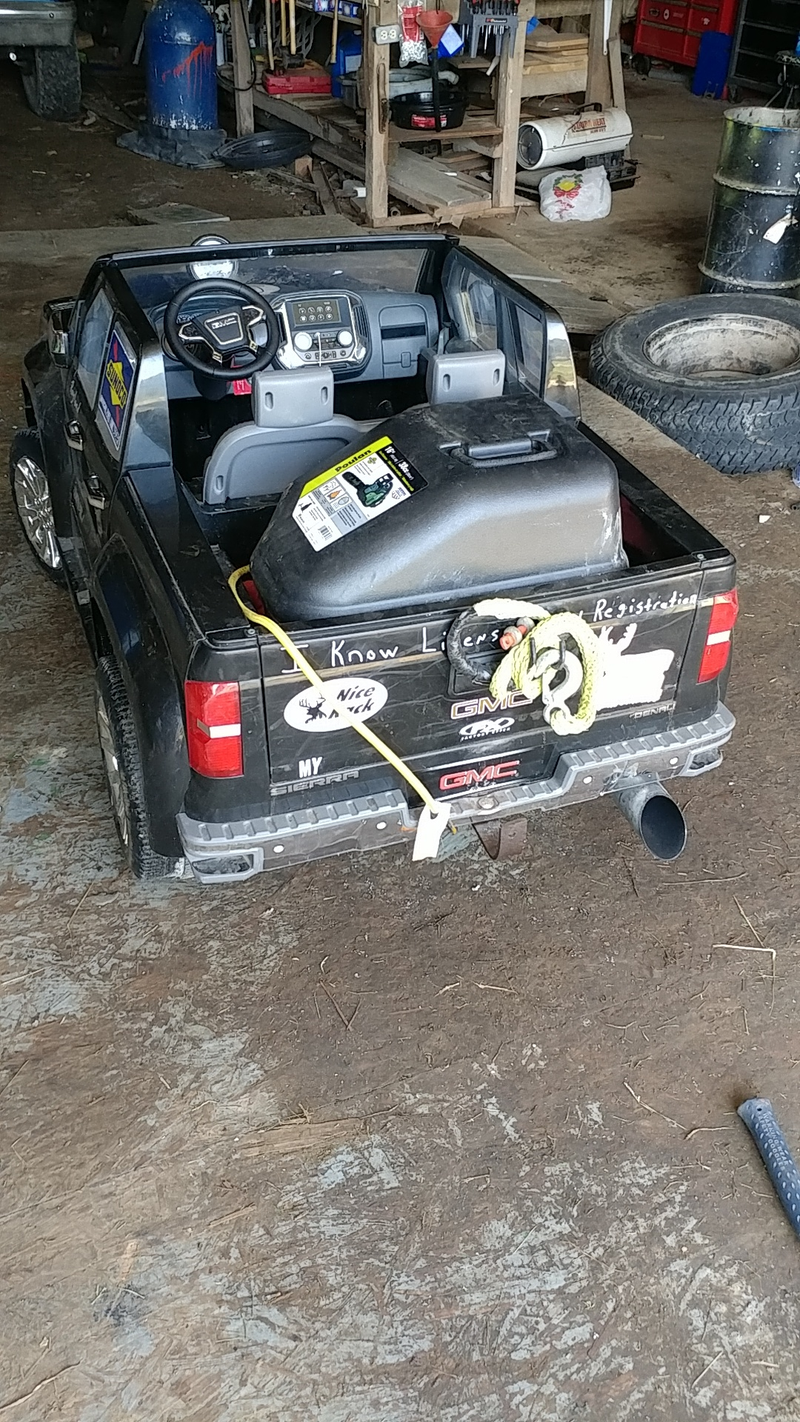 Modifications also include: hitch and hood-mounted tach.